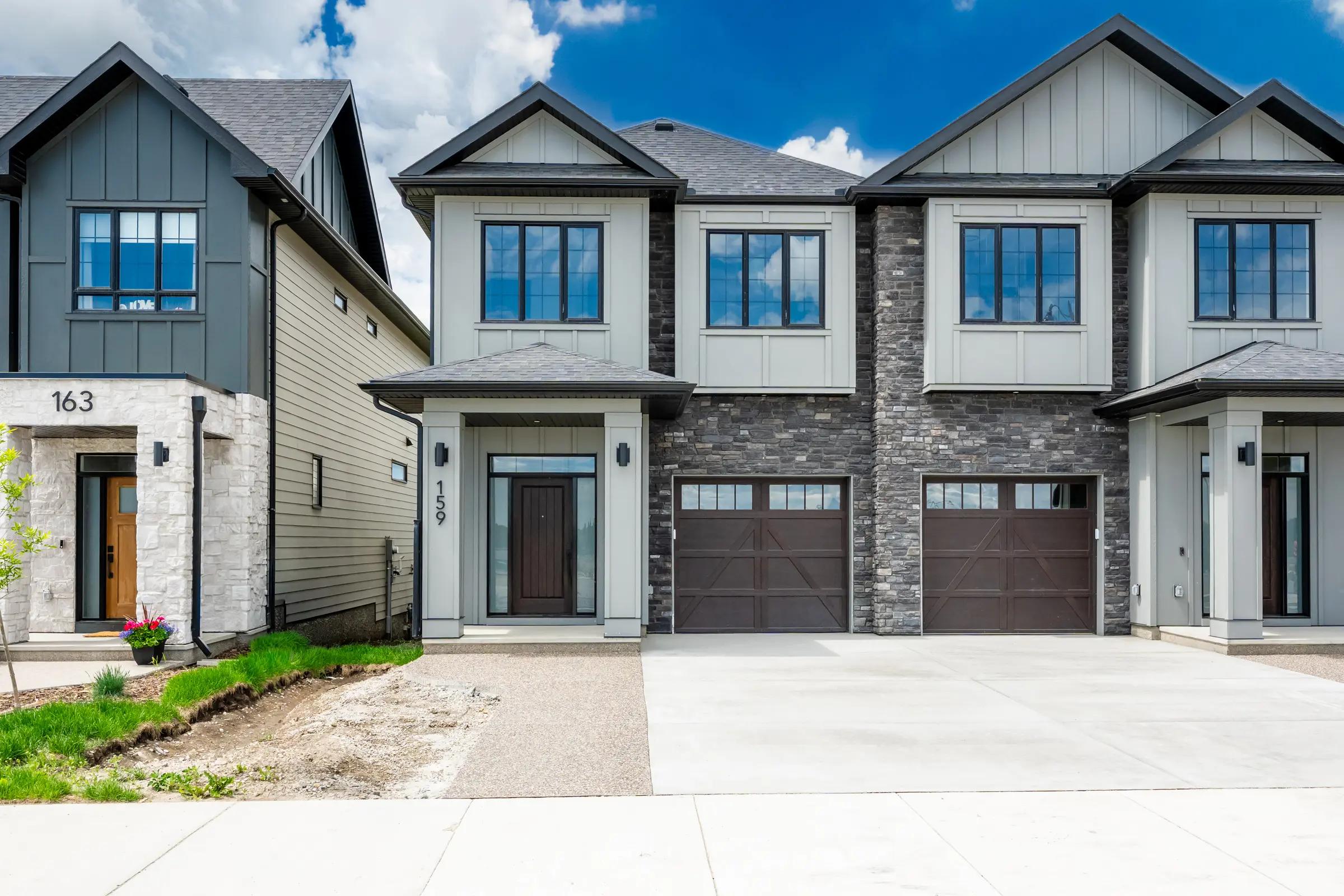159 Greenwich Drive NW seen from the street, a new luxury home in Upper Greenwich, Calgary.